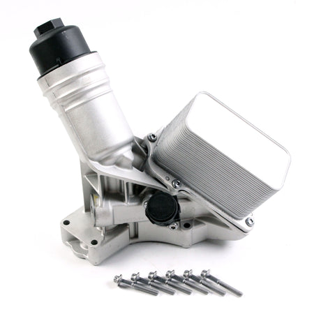 Aluminum engine oil filter housing with filter canister and mounting bolts