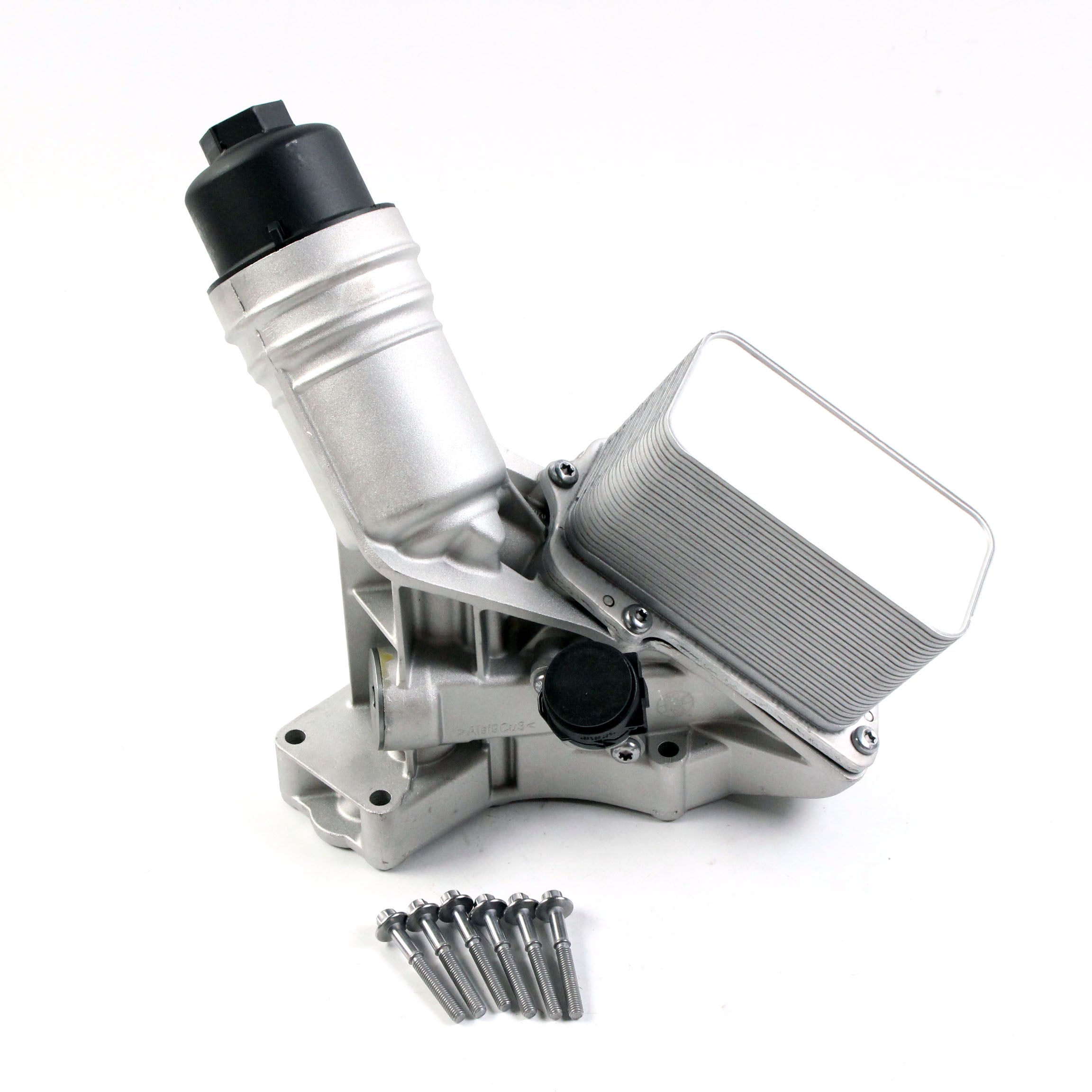 Aluminum engine oil filter housing with attached filter element and bolts