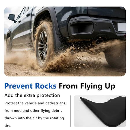 Black mud flap on pickup rear wheel, protecting from road debris