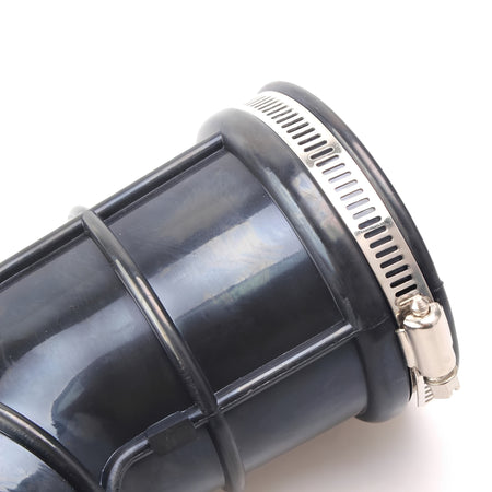Close-up of black air intake hose with silver metal clamp ring