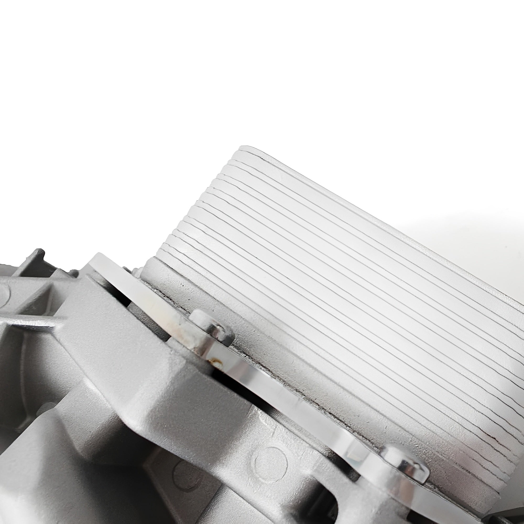 Oil filter housing end cap with pleated filter element