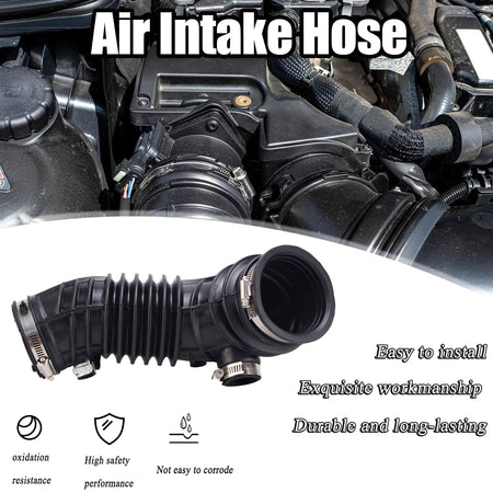 Engine air intake hose in engine bay, ribbed black rubber with metal clamp