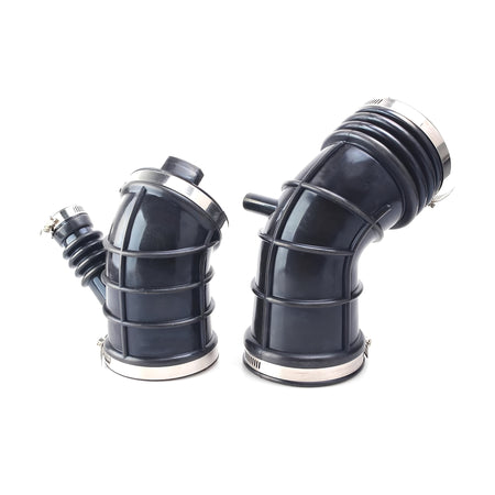 Black air intake hose elbows with stainless-style band clamps