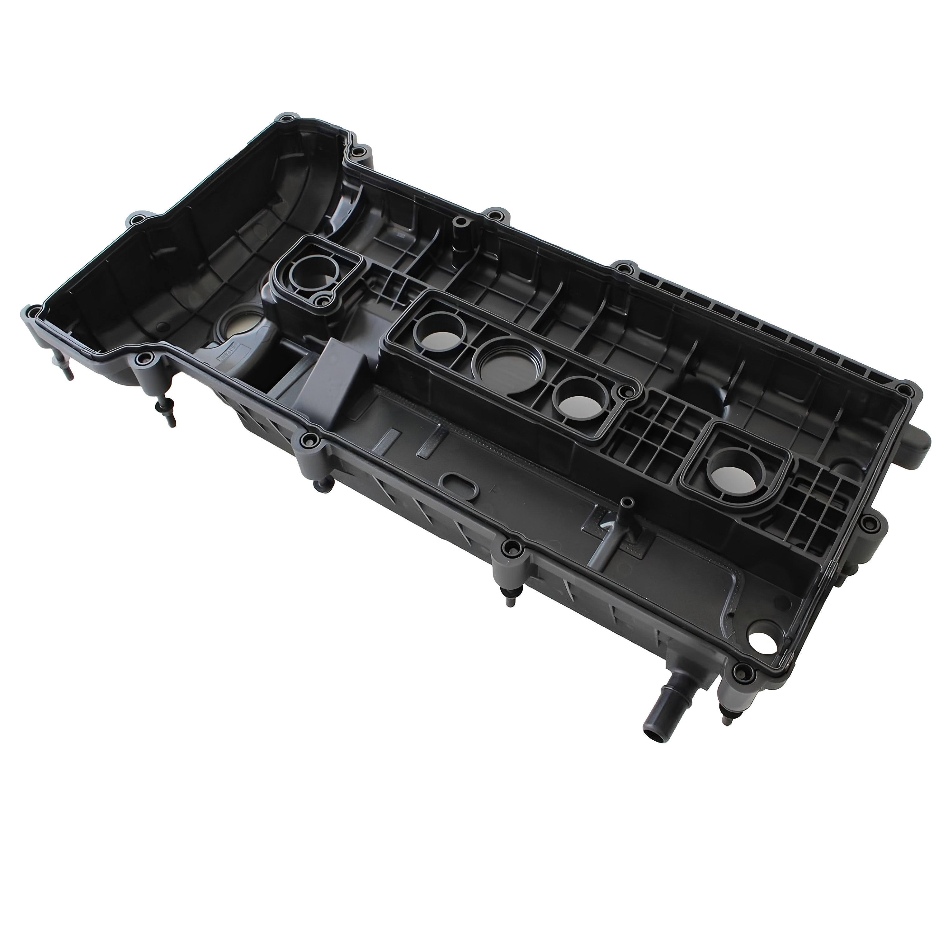 Black engine valve cover with internal chambers and circular openings
