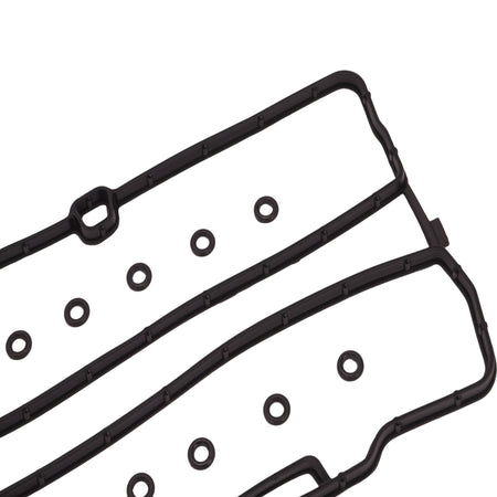 Valve cover gasket with multiple rubber grommets shown in close-up