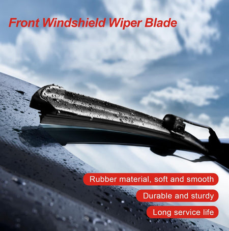 Black windshield wiper blade with rubber edge, on wet car glass