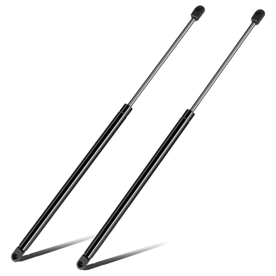 Two black gas struts for tailgate lift supports with ball-end mounts