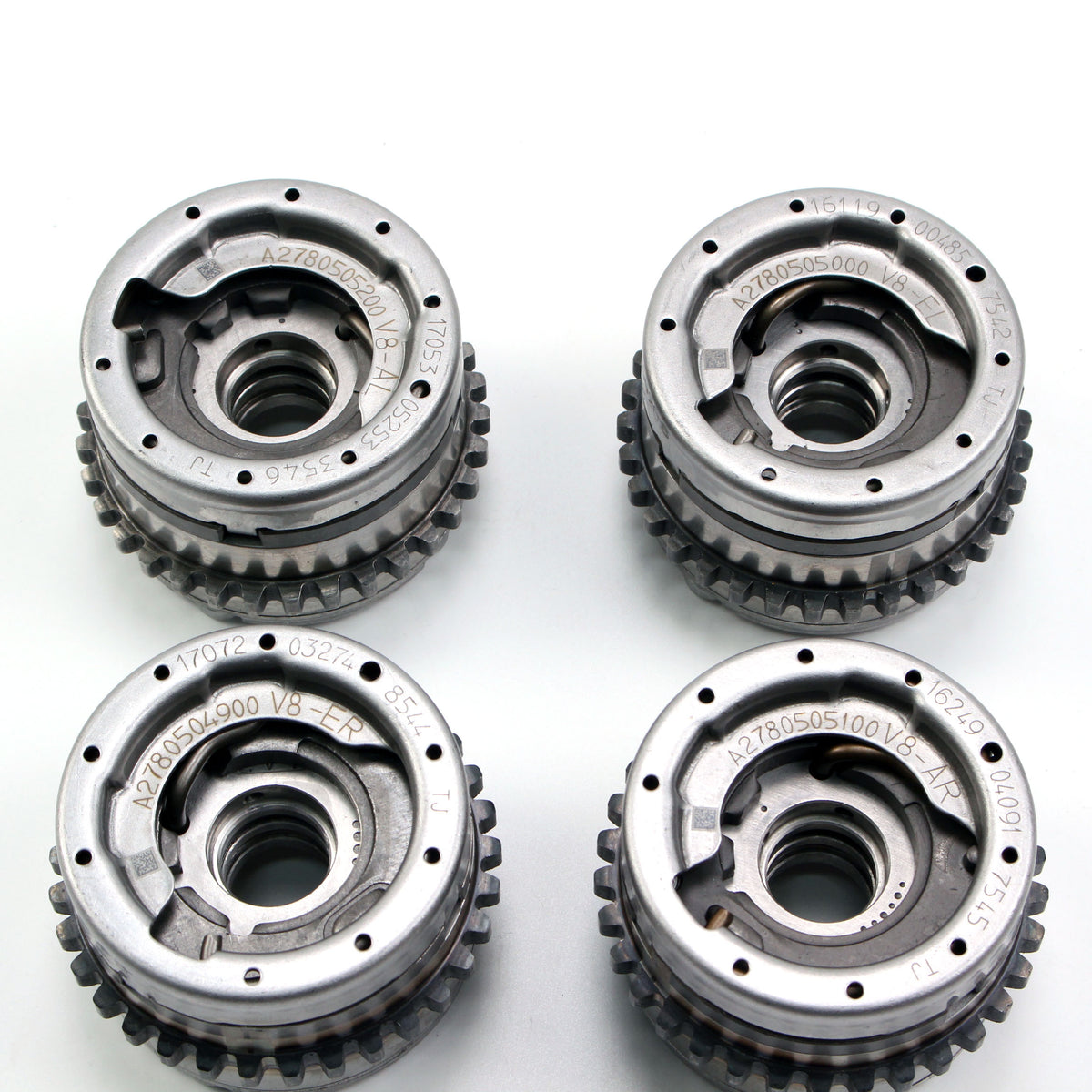 Timing gear sprockets with toothed edges and center holes, silver metal finish