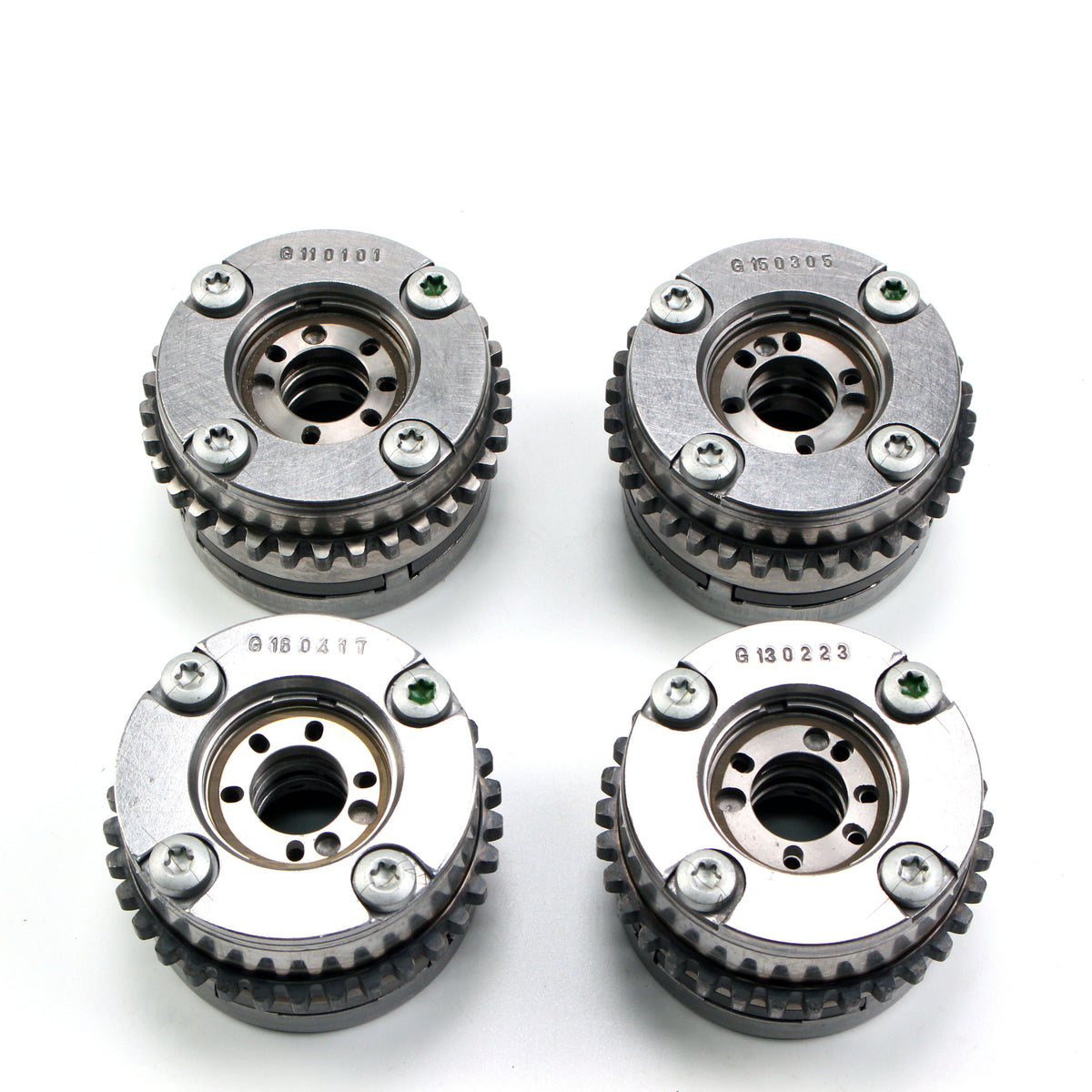 Timing gear sprockets with bolt heads and toothed rings, silver metal