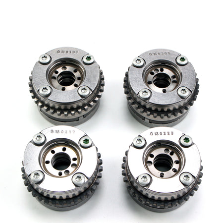 Timing gear sprockets with bolt heads and toothed rings, silver metal