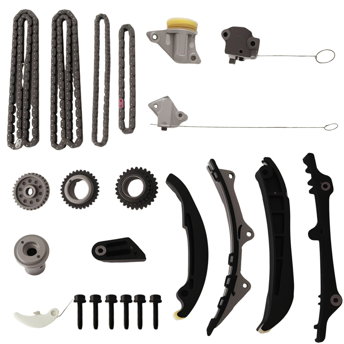 Timing chain kit parts assortment: chains, guide rails, tensioners, bolts, and sprockets