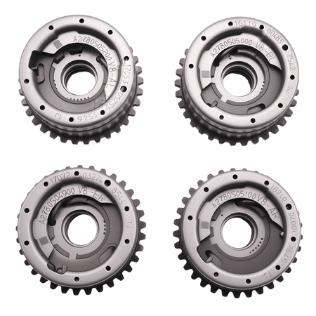 Four steel timing sprocket gears with central ring and toothed edges