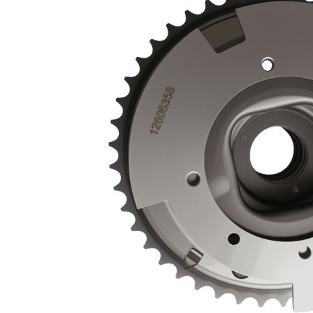 Gray VVT sprocket gear with central hole and stamped markings