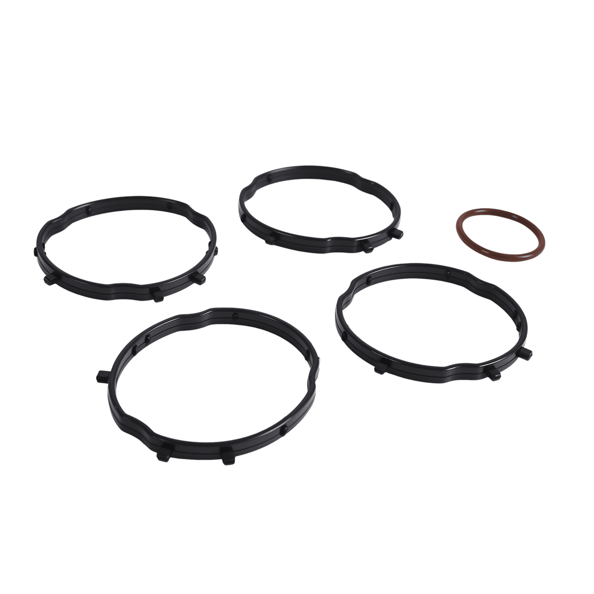 Valve cover gasket set featuring four black circular gaskets and one small red ring