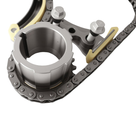 Metal timing chain guide and tensioner with VVT sprocket housing
